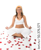 Beautiful woman meditating . Стоковое фото, агентство Ingram Publishing / Фотобанк Лори
