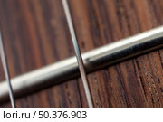 electric guitar, close-up, fingerboard, fret and strings. Стоковое фото, агентство Ingram Publishing / Фотобанк Лори