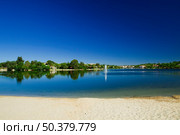 Landscape picture of a beautiful artificial laggon - Quinta do Lago, Faro, Portugal. Стоковое фото, агентство Ingram Publishing / Фотобанк Лори