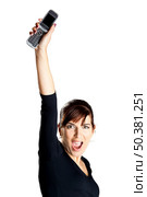 Portrait of a beautiful and happy young woman holding a cell phone. Стоковое фото, агентство Ingram Publishing / Фотобанк Лори