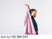 girl showing smelly cloth. Стоковое фото, агентство Ingram Publishing / Фотобанк Лори