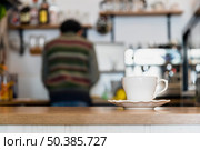 white coffee cup saucer coffee counter. Стоковое фото, агентство Ingram Publishing / Фотобанк Лори