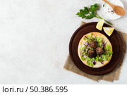delicious arabic fast food meat rolls copy space. Стоковое фото, агентство Ingram Publishing / Фотобанк Лори