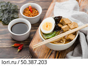 homemade ramen soup soy sauce with jalapenos. Стоковое фото, агентство Ingram Publishing / Фотобанк Лори