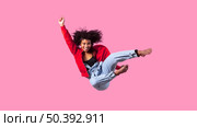 portrait young female jumping 7. Стоковое фото, агентство Ingram Publishing / Фотобанк Лори