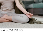young woman meditating home close up. Стоковое фото, агентство Ingram Publishing / Фотобанк Лори