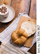 cappuccino coffee bread slice with cheese chopping board table. Стоковое фото, агентство Ingram Publishing / Фотобанк Лори