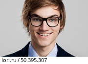 Portrait of a handsome business man wearing glasses. Стоковое фото, агентство Ingram Publishing / Фотобанк Лори