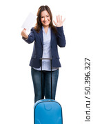 Business woman carrying a suitcase, isolated over white background. Стоковое фото, агентство Ingram Publishing / Фотобанк Лори