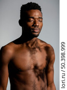 medium shot shirtless man posing. Стоковое фото, агентство Ingram Publishing / Фотобанк Лори