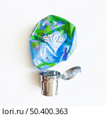 deflated earth balloon metal trash bin. Стоковое фото, агентство Ingram Publishing / Фотобанк Лори