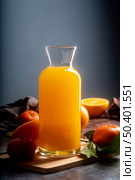 delicious orange juice bottle. Стоковое фото, агентство Ingram Publishing / Фотобанк Лори