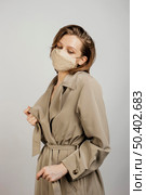 portrait young woman wearing mask 2. Стоковое фото, агентство Ingram Publishing / Фотобанк Лори