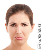 Close-up portrait of a young woman doing a pout expression, over a white background. Стоковое фото, агентство Ingram Publishing / Фотобанк Лори