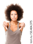 Afro-American young woman isolated on white doing a thumbs down signal with her hand. Стоковое фото, агентство Ingram Publishing / Фотобанк Лори
