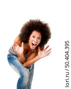 Afro-American young woman yelling with afraid of something, isolated on white. Стоковое фото, агентство Ingram Publishing / Фотобанк Лори