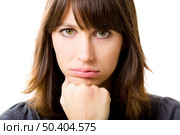 Portrait of a beautiful young woman worried with something, isolated on white background. Стоковое фото, агентство Ingram Publishing / Фотобанк Лори