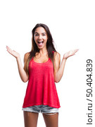 Beautiful young woman standing with arms open, isolated over a white background. Стоковое фото, агентство Ingram Publishing / Фотобанк Лори