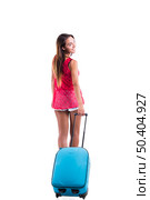 Happy woman going on vacation and walking with a suitcase. Стоковое фото, агентство Ingram Publishing / Фотобанк Лори