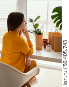 beautiful gardener sitting chair 3. Стоковое фото, агентство Ingram Publishing / Фотобанк Лори