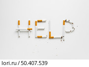top view words made by cigarretes. Стоковое фото, агентство Ingram Publishing / Фотобанк Лори