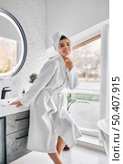 young woman feeling good indoors 3. Стоковое фото, агентство Ingram Publishing / Фотобанк Лори
