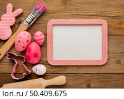 top view colorful easter eggs with frame paint brush rolling pin. Стоковое фото, агентство Ingram Publishing / Фотобанк Лори