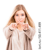 Beautiful blonde girl promise something, isolated over white background. Стоковое фото, агентство Ingram Publishing / Фотобанк Лори