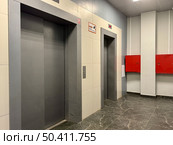 Cargo and passenger elevators in the entrance of an apartment building. Стоковое фото, фотограф Соболева Наталия / Фотобанк Лори