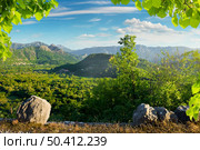 Montenegro, panorama of mountains and sunset sky. Canyon near the town of Zabljak. Canyon near the town of Zabljak. Стоковое фото, агентство Ingram Publishing / Фотобанк Лори