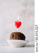 tasty cake with burning candle wand. Стоковое фото, агентство Ingram Publishing / Фотобанк Лори