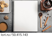 top view notebook with coffee grinder cookies. Стоковое фото, агентство Ingram Publishing / Фотобанк Лори