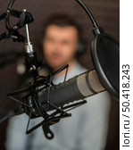 blurry man with radio equipment. Стоковое фото, агентство Ingram Publishing / Фотобанк Лори