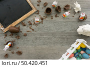 easter day composition with chocolate eggs rabbits. Стоковое фото, агентство Ingram Publishing / Фотобанк Лори
