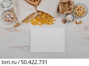 various pantry products notepad copy space. Стоковое фото, агентство Ingram Publishing / Фотобанк Лори