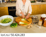 Preparing fermented preserved vegetables. Cabbage kimchi and sauerkraut sour cabbage. . Стоковое фото, агентство Ingram Publishing / Фотобанк Лори