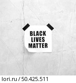 black lives matter concrete surface. Стоковое фото, агентство Ingram Publishing / Фотобанк Лори