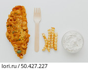 top view fish chips with sauce fork. Стоковое фото, агентство Ingram Publishing / Фотобанк Лори
