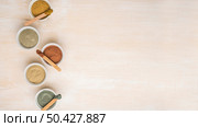 top view assortment powders bowls with copy space. Стоковое фото, агентство Ingram Publishing / Фотобанк Лори
