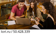 Group of friends studying together for finals. Стоковое фото, агентство Ingram Publishing / Фотобанк Лори