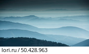 Beautiful abstract monochrome mountain landscape in blue tonality. Стоковое фото, агентство Ingram Publishing / Фотобанк Лори