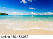 Beautiful view of a tropical beach in Praslin, Seychelles. Стоковое фото, агентство Ingram Publishing / Фотобанк Лори