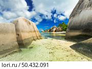 The beautiful Anse Source D’Argent beach in La Digue Island, Seychelles. Стоковое фото, агентство Ingram Publishing / Фотобанк Лори