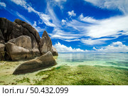 The beautiful Anse Source D’Argent beach in La Digue Island, Seychelles. Стоковое фото, агентство Ingram Publishing / Фотобанк Лори