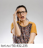 Cute Portrait of a woman worried with something. Стоковое фото, агентство Ingram Publishing / Фотобанк Лори