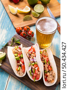 high angle delicious tacos beer. Стоковое фото, агентство Ingram Publishing / Фотобанк Лори