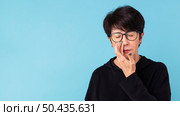 woman covering nostril with copy space. Стоковое фото, агентство Ingram Publishing / Фотобанк Лори