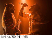 long hair guitar guy vocalist stage. Стоковое фото, агентство Ingram Publishing / Фотобанк Лори
