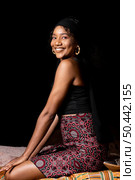 sideways beautiful african woman. Стоковое фото, агентство Ingram Publishing / Фотобанк Лори