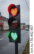 Funny and conceptual traffic light on road crossing, Iceland changes from green to red. The stop signal in shape of heart. Concept relationship, romantic date and tenderness. St Valentine vibes. Стоковое AI-видео, аниматор Sergey Grishin / Фотобанк Лори